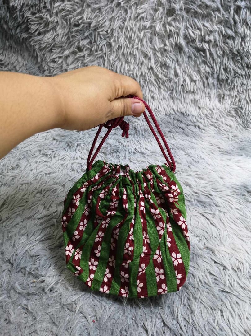 Small Green Striped With Floral Pattern Pouch (Category: Purses & Pouches) located in Santa Cruz. Submitted by jmy_surplus.2 (Listing ID 1462786784, Image 3). Description: Size ; L - 7.6 W - 10 Color ; Green Type ; Pouch Brand ; No brand Material ; Canvas Style ; Floral pattern Drawstring Pouch LR 129 JMY 5 Batch #222.
