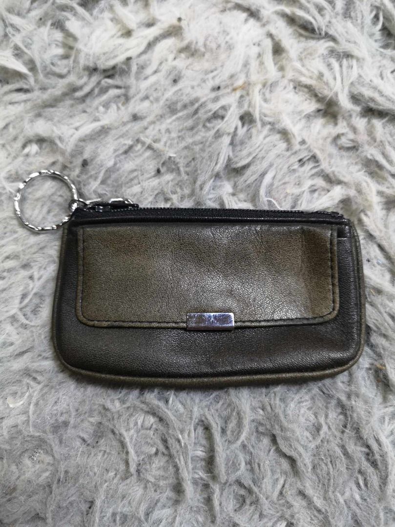 Small rectangular Leather Zipper Closure Coin Purse (Category: Wallets & Card Holders) located in Santa Cruz. Submitted by jmy_surplus.2 (Listing ID 1462684216, Image 1). Description: Size ; L- 2.4 W - 4.3 Color ; Dark Color Type ; Purse Brand ; No brand Material ; Leather Style ; Zipper Closure Leather Coin Purse LR 129 JMY 4 Batch #222.
