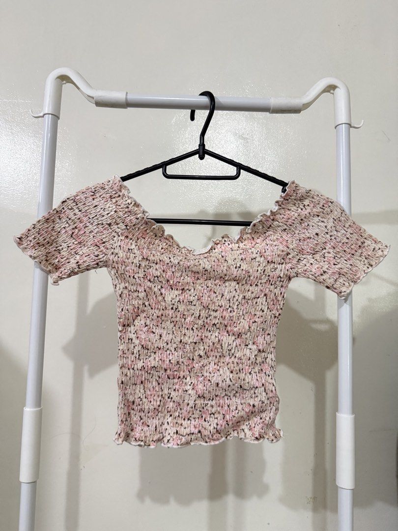 Smocked Off-Shoulder Floral Crop Top (Category: Others Tops) located in Manila. Submitted by lovedbyan (Listing ID 1462877809, Image 2). Description: -₱150 -H&M -XS-S - Cute floral print smocked crop top - Off-shoulder design with ruffled neckline and hem - Short sleeves - Stretchy and comfortable material - Versatile for casual or dressed-up looks.
