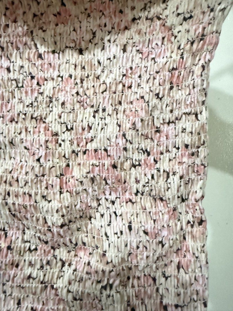 Smocked Off-Shoulder Floral Crop Top (Category: Others Tops) located in Manila. Submitted by lovedbyan (Listing ID 1462877809, Image 3). Description: -₱150 -H&M -XS-S - Cute floral print smocked crop top - Off-shoulder design with ruffled neckline and hem - Short sleeves - Stretchy and comfortable material - Versatile for casual or dressed-up looks.