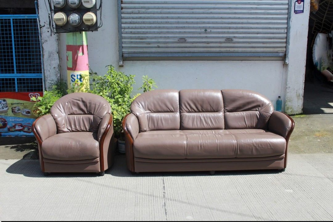 Sofa (Category: Sofas) located in Meycauayan. Submitted by marygracecasimiro (Listing ID 1462817452, Image 3). Description: MARUNI Brown Leather Sofa Set Classic European-style brown leather sofa set with a 3-seater sofa and matching armchair. Elegant wooden accents, plush tufted backrests and sturdy construction. Perfect for living rooms, lounges or offices L:69 • W:28 • Seat H:15 • Back H:31 L:32 • W:28 • Seat H:15 • Back H:31inches 16,500 peso
