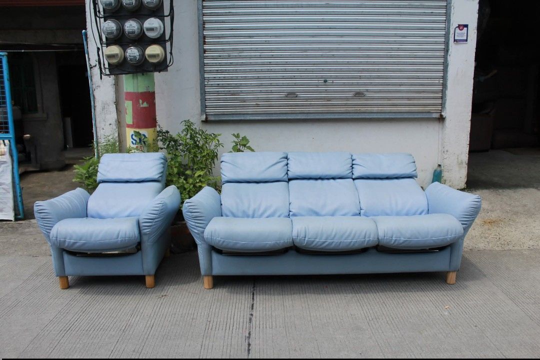 Sofa (Category: Sofas) located in Meycauayan. Submitted by marygracecasimiro (Listing ID 1462832452, Image 3). Description: Light Blue Leather Manual Recliner Set 3-seater sofa and matching armchair. Plush channel-tufted cushions, padded armrests and manual reclining functionality. Perfect for living rooms, lounges or statement interiors L:79 • W:30 • Seat H:17 • Back H:38 L:37 • W:30 • Seat H:17 • Back H:38 • Back H:31inches Set for only 17,800 