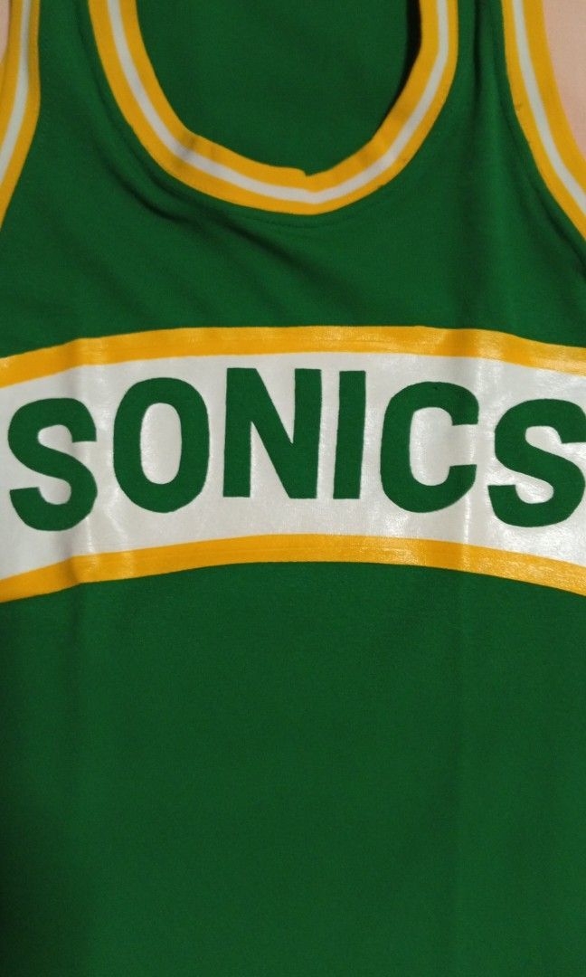 Sonics Womens Jersey (Category: Activewear) located in Quezon City. Submitted by jojoleen28 (Listing ID 1462825538, Image 2). Description: No brand, vintage style Sonics jersey made of 100% nylon. No crack print. Can fit kids or petite women. Measurements: Chest up to 38" Length 28.5" #Christmas2026.