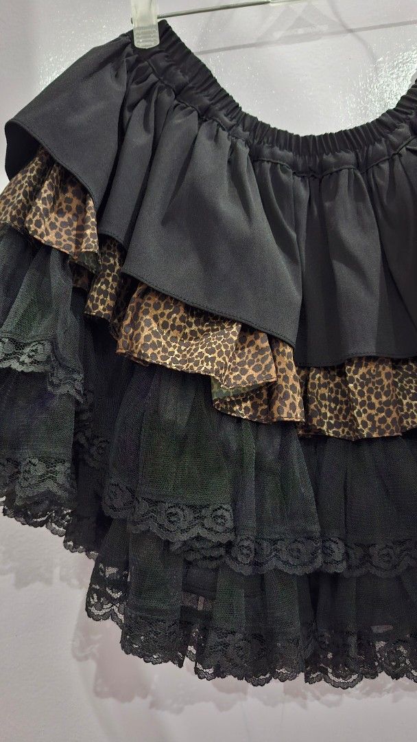 Spider Black Ruffle Tutu Skirt with Leopard Print (Category: Skirts) located in Quezon City. Submitted by croppedph (Listing ID 1462881307, Image 2). Description: length: 17" waist: upto 36" - Adorable black ruffled skirt - Features multiple ruffles and layers - Chic leopard print accents interspersed with black ruffles - Comfortable elastic waistband for a perfect fit - Ideal for parties, costumes, or everyday fun and flirty style -punk, gothic,