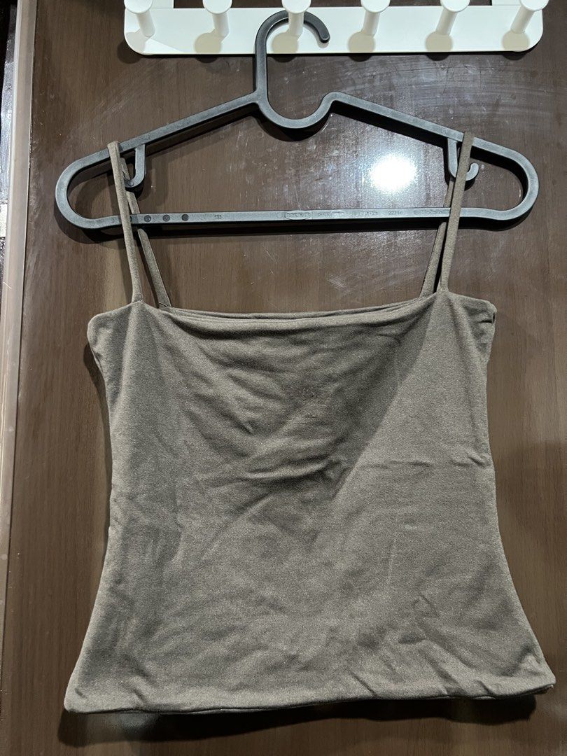 SPONTY tank top (Category: Sleeveless) located in Manila. Submitted by shinneee (Listing ID 1462846581, Image 1). Description: SPONTY CHOCO BROWN TANK TOP size: M - good as new .