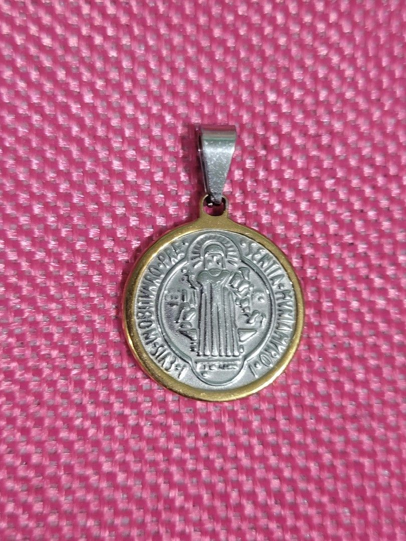 STAINLESS TWO TONE GOLD SILVER ST. BENEDICT PROTECTION PENDANT (Category: Religious Items) located in Taguig. Submitted by roumie (Listing ID 1462820257, Image 1). Description: STAINLESS TWO TONE GOLD SILVER ST. BENEDICT PROTECTION PENDANT brand new and sealed non tarnish what you see is what you get comes with jewelry pouch.