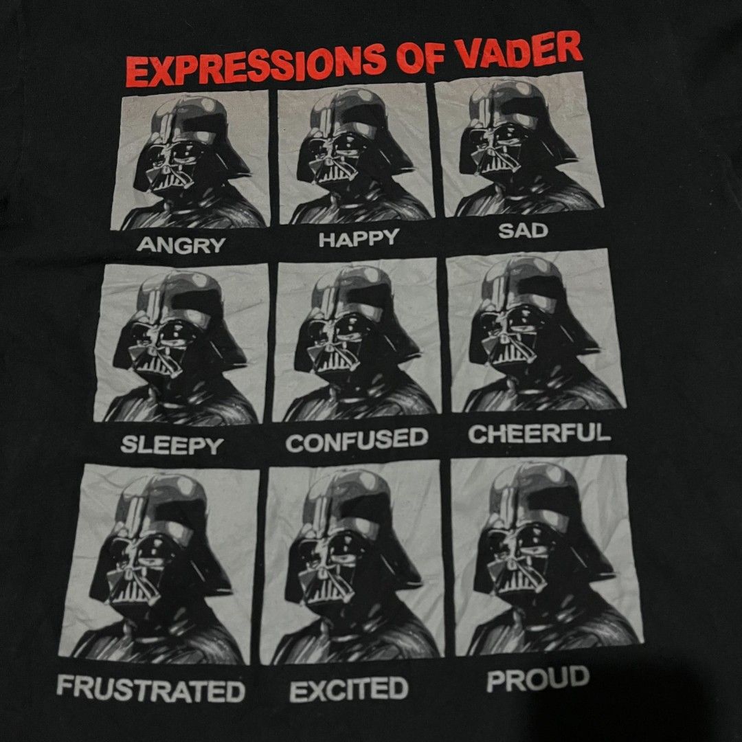 Star Wars Darth Vader Expressions T-Shirt (Category: Tshirts & Polo Shirts ) located in Baguio. Submitted by undressme24 (Listing ID 1462775348, Image 2). Description: - Black Star Wars T-shirt - Features Darth Vader with multiple expressions (angry, happy, sad, sleepy, confused, cheerful, frustrated, excited, proud) - Fun and unique design for Star Wars fans - Tag is visible.