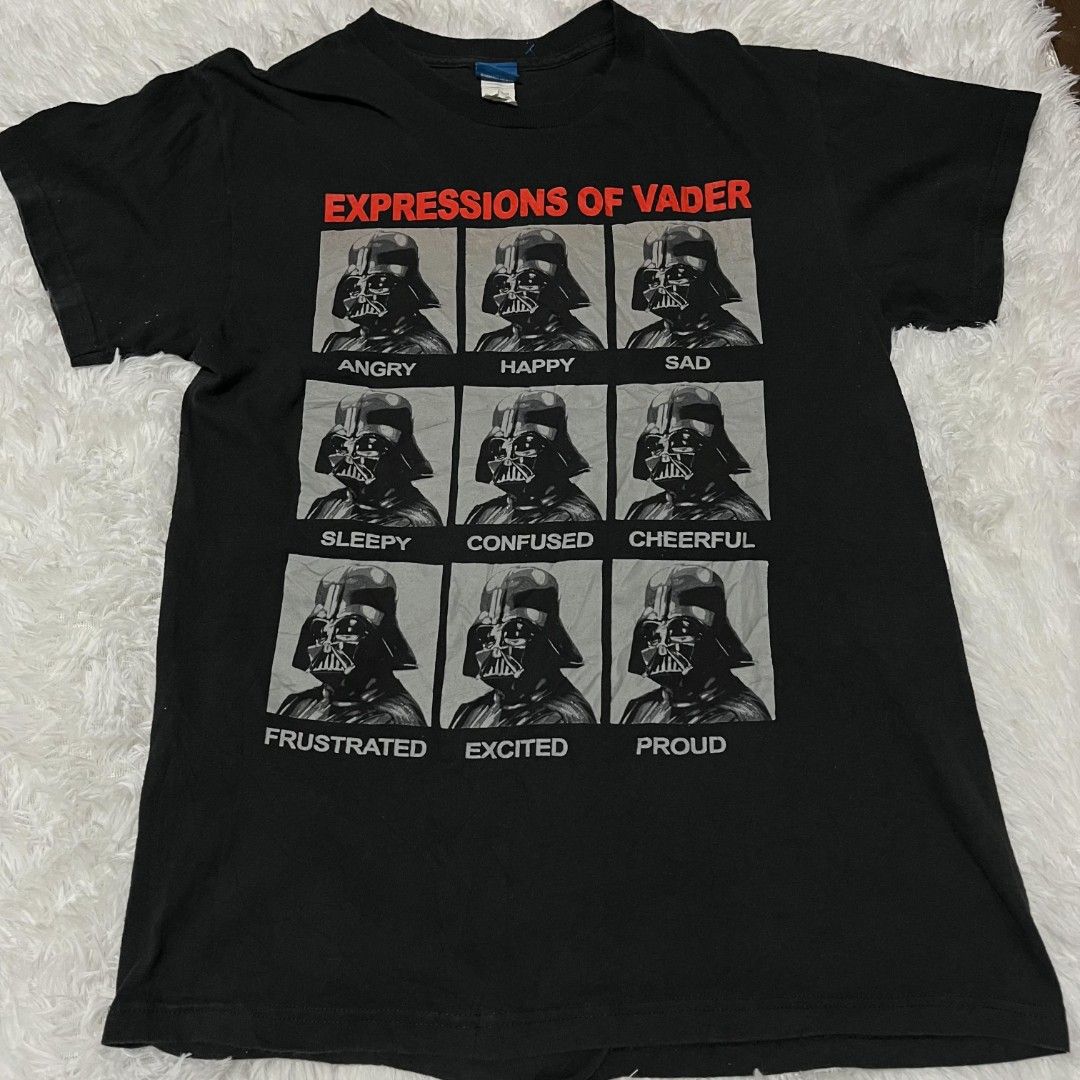 Star Wars Darth Vader Expressions T-Shirt (Category: Tshirts & Polo Shirts ) located in Baguio. Submitted by undressme24 (Listing ID 1462775348, Image 1). Description: - Black Star Wars T-shirt - Features Darth Vader with multiple expressions (angry, happy, sad, sleepy, confused, cheerful, frustrated, excited, proud) - Fun and unique design for Star Wars fans - Tag is visible.