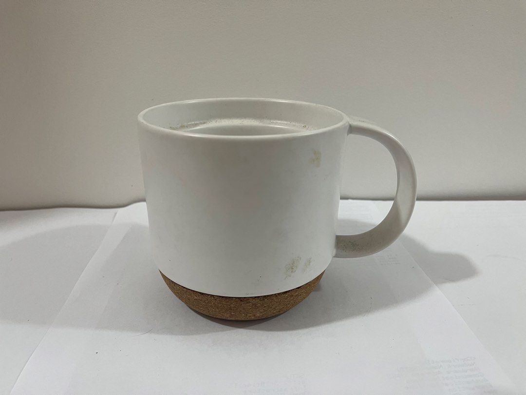 Starbucks White Mug with Cork Base (Category: Coffee & Tea Tableware) located in Pasig City. Submitted by st_03 (Listing ID 1462799824, Image 3). Description: - Classic white Starbucks mug - Features a natural cork base - Ideal for your morning coffee or tea - Perfect for Starbucks collectors or everyday use - Used for display only. - Just needs to be washed prior use. .