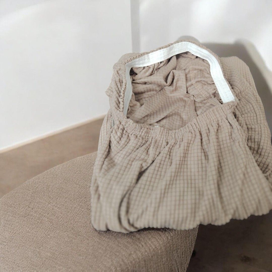 Stretchable Sofa Chair Cover - Beige (Category: Chairs) located in Antipolo. Submitted by goodsinger (Listing ID 1462724538, Image 1). Description: - Protects your sofa chair from spills and wear. - Made of soft, textured fabric. - Elasticated edges for a snug, secure fit. - Easy to put on and remove. - Beige color complements most home decor. - Keeps furniture looking fresh and clean..