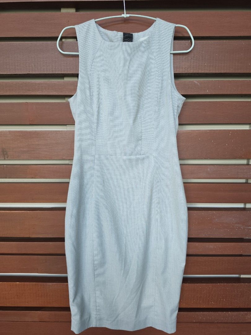 Striped Sleeveless Sheath Dress (Category: Dresses) located in Quezon City. Submitted by jctan2019 (Listing ID 1462713128, Image 1). Description: - Sleeveless design - Classic pinstripe pattern - Subtle fabric texture - Flattering sheath silhouette (fits close to the body) - Versatile for work or smart casual occasions - Easy to accessorize.