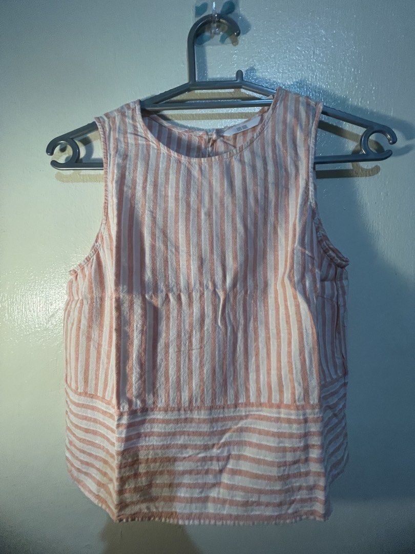 Striped Sleeveless Top (Category: Sleeveless) located in Manila. Submitted by sammmm777 (Listing ID 1462800963, Image 1). Description: - Cute sleeveless top - Features vertical stripes.