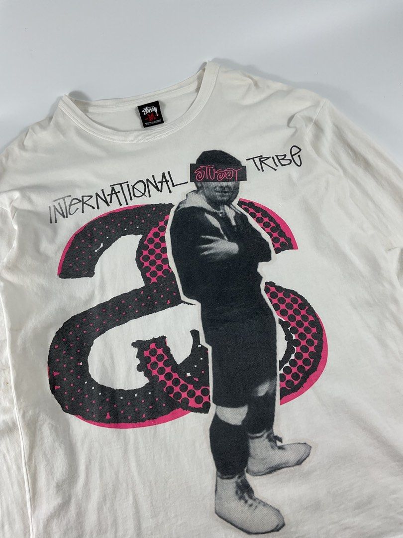 Stussy - International Tribe (Category: Activewear) located in Mabalacat. Submitted by seanthep (Listing ID 1462760886, Image 2). Description: Stussy - International Tribe Rare design / Hiphop Genre Width: 21” Length: 28” Has some stain and pinhole at hem due to aged because this shirt release mid 2000s..