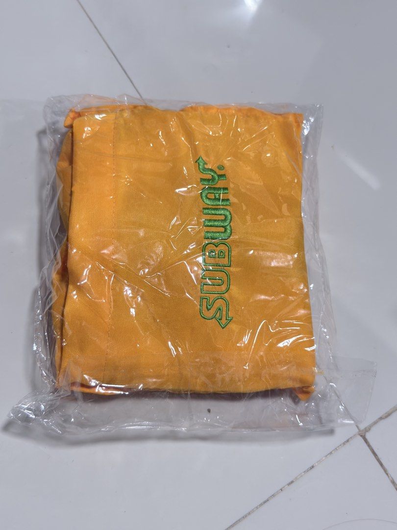 Subway Orange Tote Bag (Category: Tote Bags) located in Paranaque City. Submitted by thousandfold (Listing ID 1462694576, Image 1). Description: Sale swap to catfood for strays - Orange tote bag with iconic green Subway logo. - Brand new, sealed in original plastic packaging. - Ideal size for daily use and carrying essentials..
