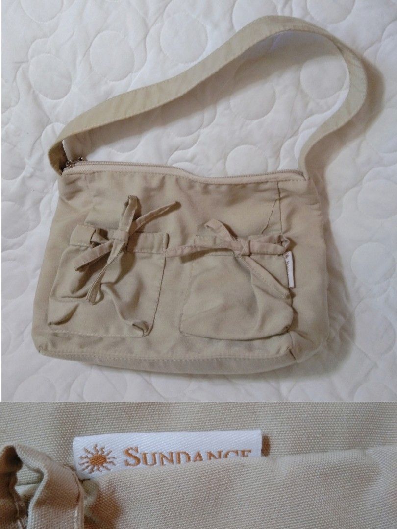 Sundance Beige Canvas Shoulder Bag (Category: Shoulder Bags) located in Baguio. Submitted by blueclover.101800 (Listing ID 1462688060, Image 1). Description: Brand: Sundance Color: Beige / Cream / Material: Cotton Canvas / Durable Fabric Blend Style: Casual Shoulder Bag / Hobo Bag / Y2K Utility.