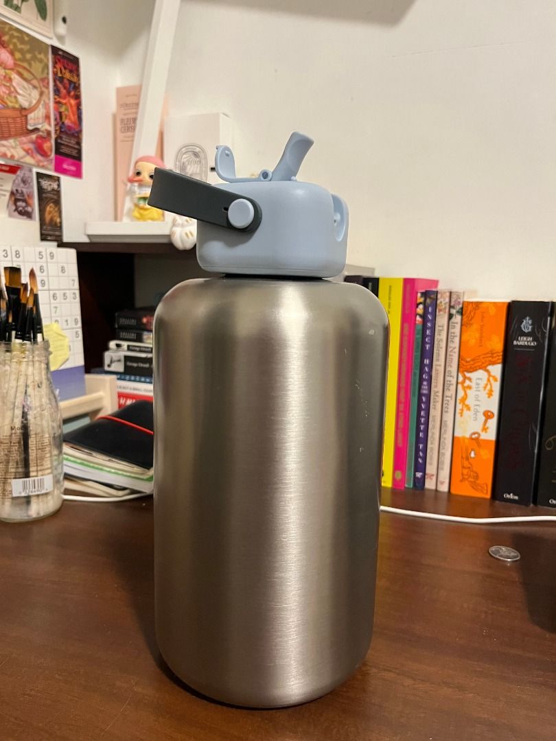 Sunnies Flask 64oz in Chrome (Category: Water Bottles & Tumblers) located in Mabalacat. Submitted by applebottomjaens (Listing ID 1462862621, Image 1). Description: - Sunnies Flask 64oz in Chrome - Robo Cap in Snow Cone - Connector in Gulaman - Upgraded to Glider (stainless steel straw) - Holds temperature better relative to other Sunnies Flask sizes - Minor exterior scratches (see photos) but overall condition is still excellent. - Small dent, b