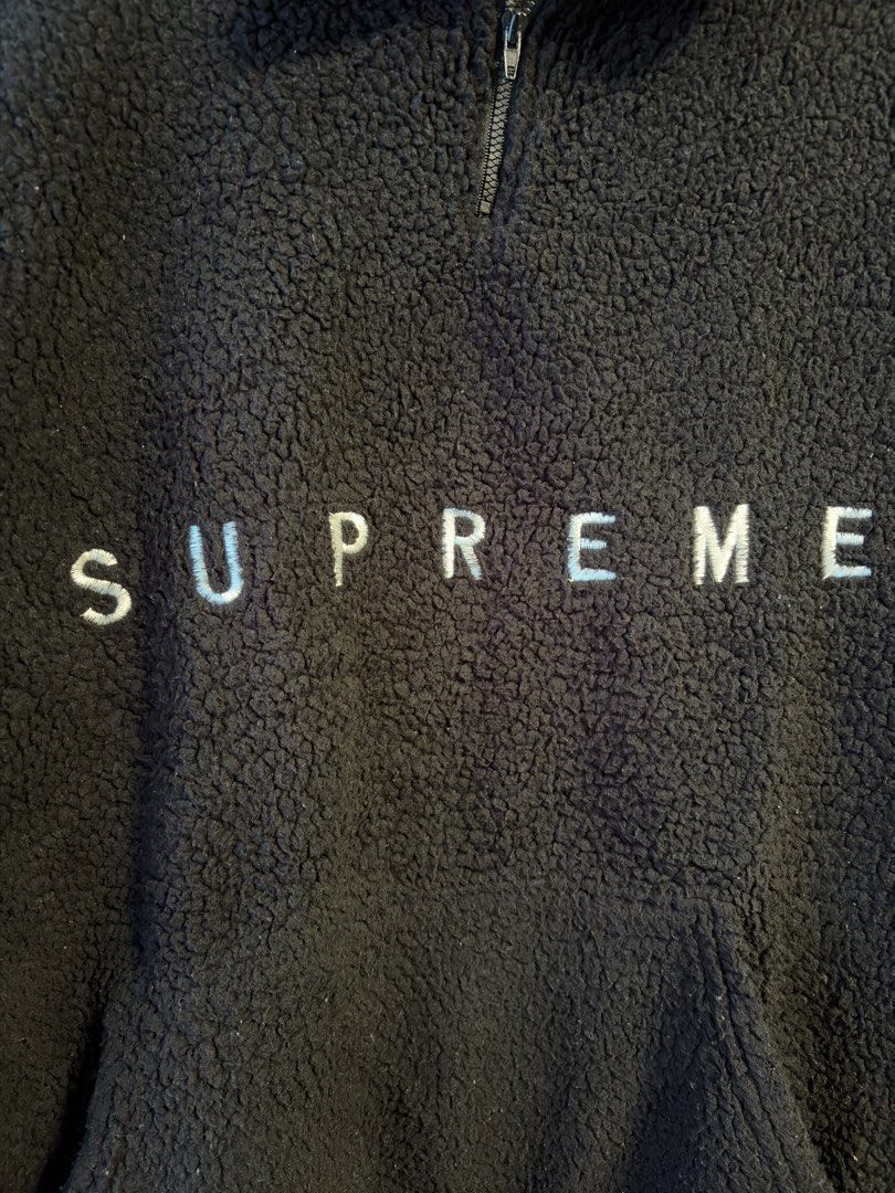 Supreme Black Sherpa Fleece Half Zip Pullover (Category: Coats, Jackets and Outerwear) located in Caloocan City. Submitted by puremountain.2e6573 (Listing ID 1462860639, Image 2). Description: - Supreme black sherpa fleece pullover - Features a half zip closure - Convenient front pouch pocket - Embroidered Supreme logo on the chest - Cozy and warm material, perfect for casual wear.