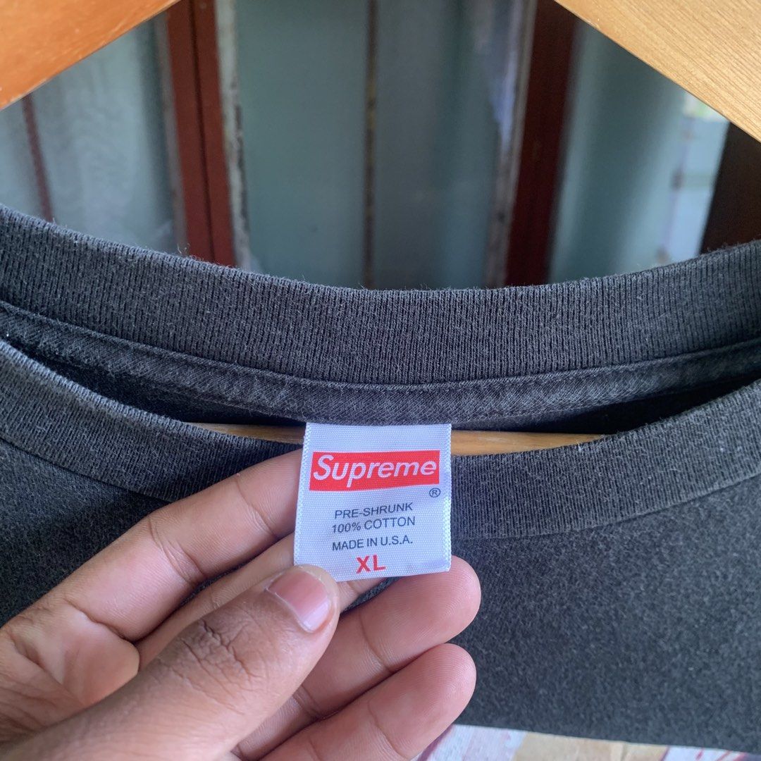 Supreme model tee (Category: Tshirts & Polo Shirts ) located in Tarlac. Submitted by thriftwithass (Listing ID 1462768786, Image 3). Description: Dimes: 25-30 Condition: 8.8/10 Color rate:9.7/10 ISSUE: not sure if crack or hairline lang check niyo last photos TY!.