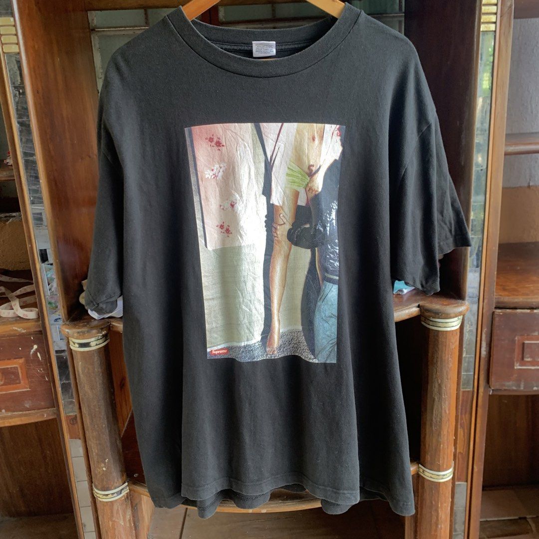 Supreme model tee (Category: Tshirts & Polo Shirts ) located in Tarlac. Submitted by thriftwithass (Listing ID 1462768786, Image 1). Description: Dimes: 25-30 Condition: 8.8/10 Color rate:9.7/10 ISSUE: not sure if crack or hairline lang check niyo last photos TY!.