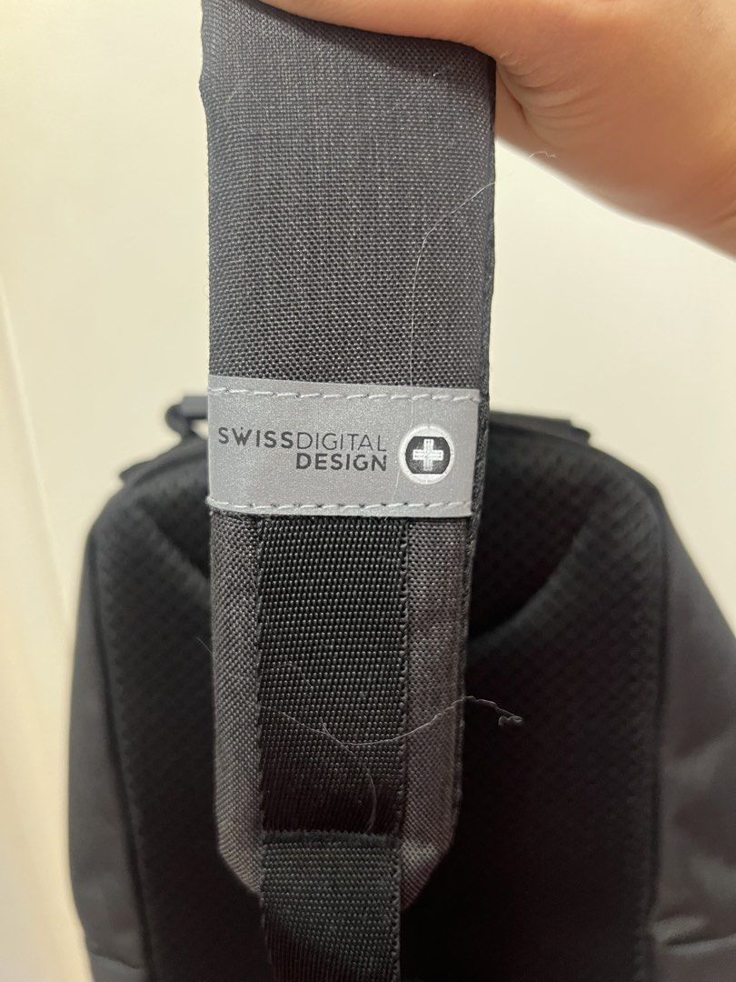 Swissdigital Design Multi-Function Crossbody Backpack – Brand New with Tags (Category: Sling Bags) located in San Fernando. Submitted by mahanne (Listing ID 1462749434, Image 3). Description: Description Brand new Swissdigital Design multi-function bag 🎒 ✨ Brand new with original tags ✨ Black color with sporty yellow accents ✨ Can be used as a crossbody/sling bag or backpack ✨ Multiple compartments for organized storage ✨ Lightweight and practic