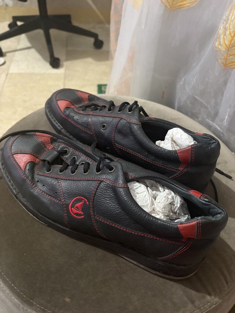 Switch Seabridge Bowling Shoes Black Red Leather (Category: Dress Shoes) located in Caloocan City. Submitted by majaliwalas (Listing ID 1462833496, Image 3). Description: - Stylish black and red leather bowling shoes - Classic lace-up closure - Distinctive Switch Seabridge logo on the soles - Comes with protective shoe covers.