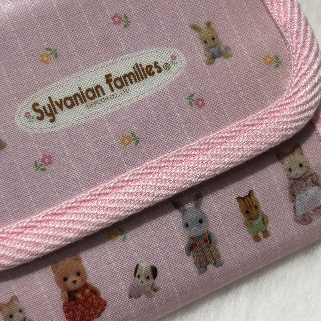 Sylvanian Families Pink Wallet (Category: Wallets & Card holders) located in Quezon City. Submitted by kitsune.treasures (Listing ID 1462695974, Image 3). Description: *First to pay policy! *1 day reservation only. Failure to pay on time, auto cancel. 📍Quezon City * MOD: J&T | Lalamove * MOP: GCASH | BPI 📦ON HAND AND READY TO SHIP! CONDITION: WHAT YOU SEE IS WHAT YOU GET. Dimensions: Kindly check the photos for the actual measurements. Please c