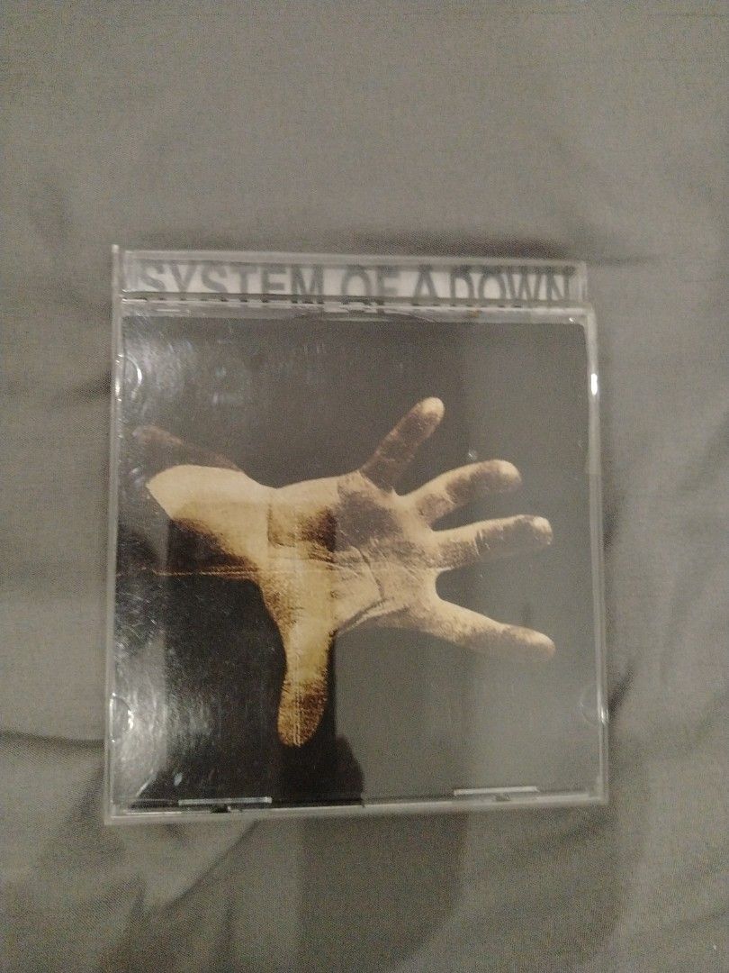 System Of A Down CD (Category: CDs & DVDs) located in Manila. Submitted by .rinn_ (Listing ID 1462845183, Image 1). Description: Jewel case broken but the cd still plays well.