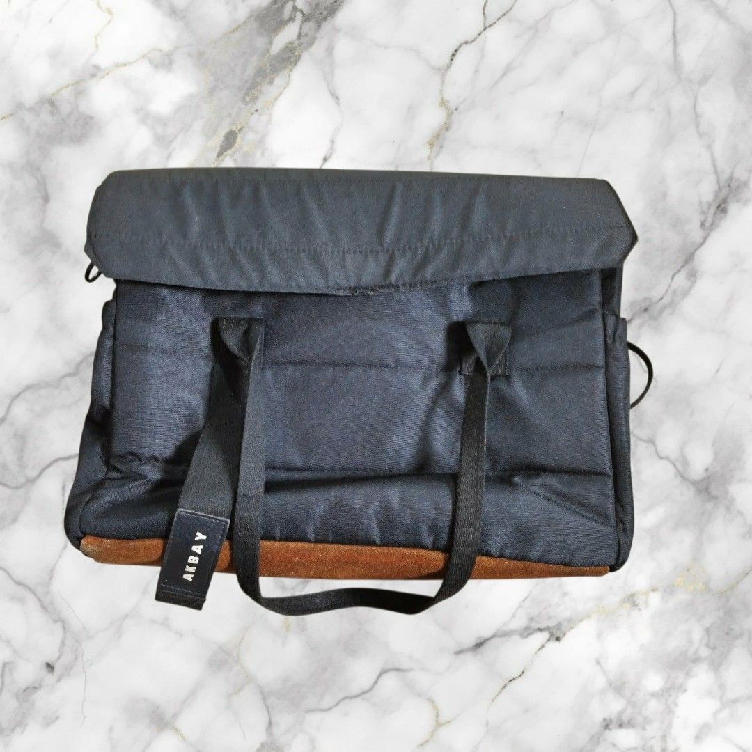 The Executive Multi-way Bag (Category: Sling Bags) located in Paranaque City. Submitted by calm_youngstore7 (Listing ID 1462812713, Image 3). Description: The Executive Multi-way Bag from the Filipino local brand Akbay Key Product Details Versatile Carrying Options: It features a functional 3-way convertible design that allows it to transition smoothly between a briefcase, messenger shoulder bag, and a casual backpack configuration. Storage & Uti