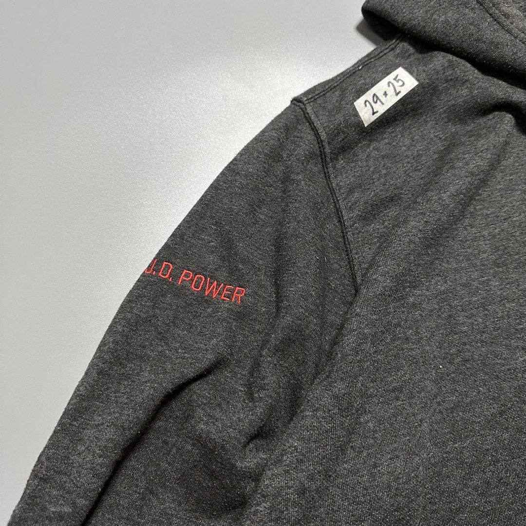 The North Face Hoodie Jacket (Category: Coats, Jackets and Outerwear) located in Baguio. Submitted by subaitems (Listing ID 1462780190, Image 3). Description: - Grey hoodie from The North Face - Features 'J.D. POWER' graphic on the sleeve - Classic North Face logo embroidered on the chest - Includes drawstring hood for adjustable comfort - Convenient front pocket for essentials - Ideal for everyday casual wear.