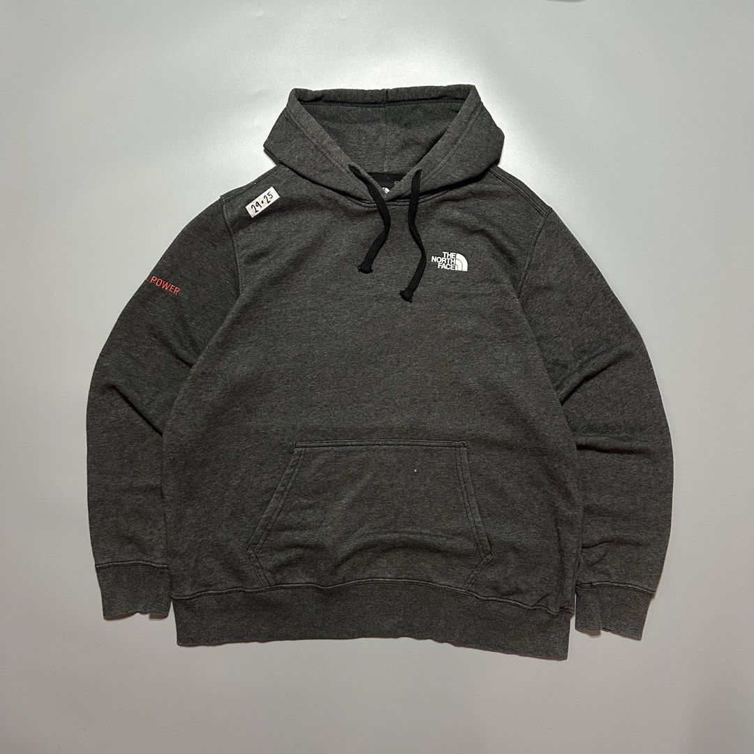 The North Face Hoodie Jacket (Category: Coats, Jackets and Outerwear) located in Baguio. Submitted by subaitems (Listing ID 1462780190, Image 1). Description: - Grey hoodie from The North Face - Features 'J.D. POWER' graphic on the sleeve - Classic North Face logo embroidered on the chest - Includes drawstring hood for adjustable comfort - Convenient front pocket for essentials - Ideal for everyday casual wear.