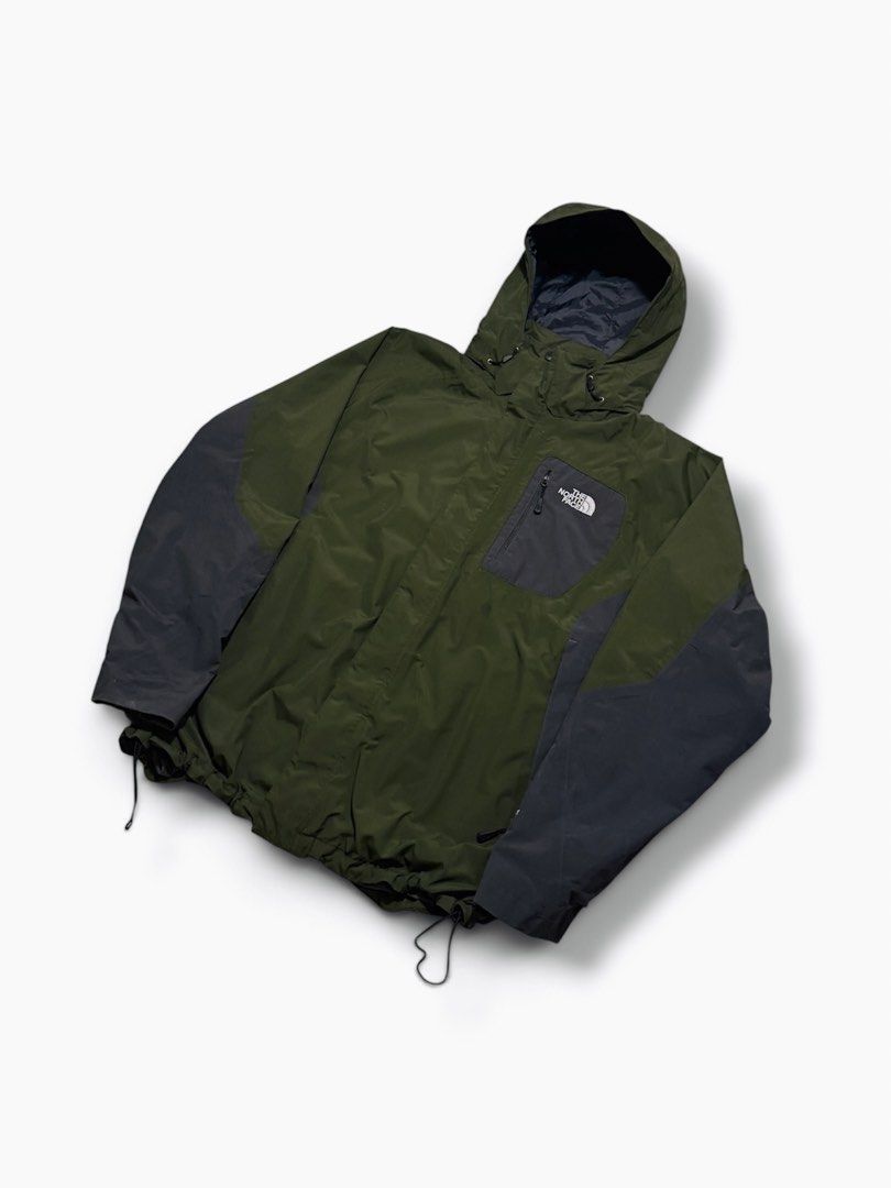 The North Face Jacket Army Green (Category: Coats, Jackets and Outerwear) located in Cabuyao City. Submitted by 0ld_souls (Listing ID 1462865273, Image 1). Description: - Brand: The North Face - Color: Olive Green & Dark Grey - Size: Men's L/G - Features: Hood, adjustable waist drawstring, zippered front pockets - Ideal for: Outdoor activities, everyday wear.