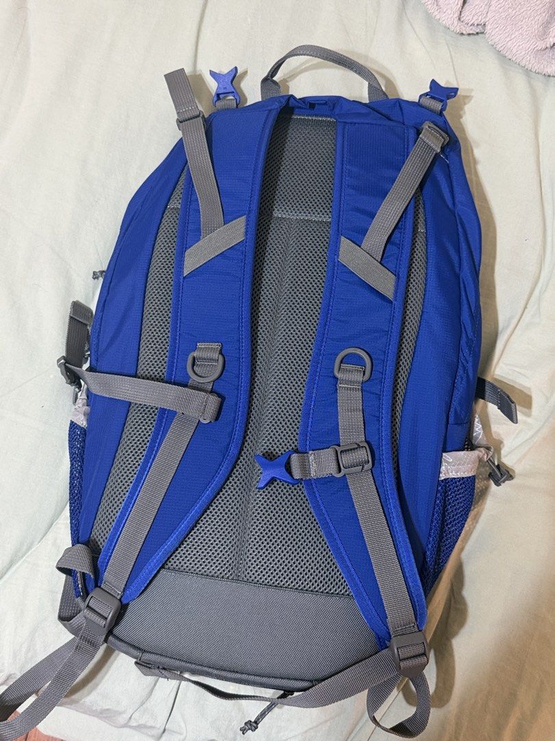 thisisneverthat Backpack (Category: Backpacks) located in Singapore. Submitted by samagksan (Listing ID 1461618060, Image 4). Description: - Brand: thisisneverthat - Color: Blue - Features: Multiple pockets for organization - Side Pockets: Mesh - Front Compartment: Zip closure - Reflective Details: On cords and straps - Ideal for: School, day trips.