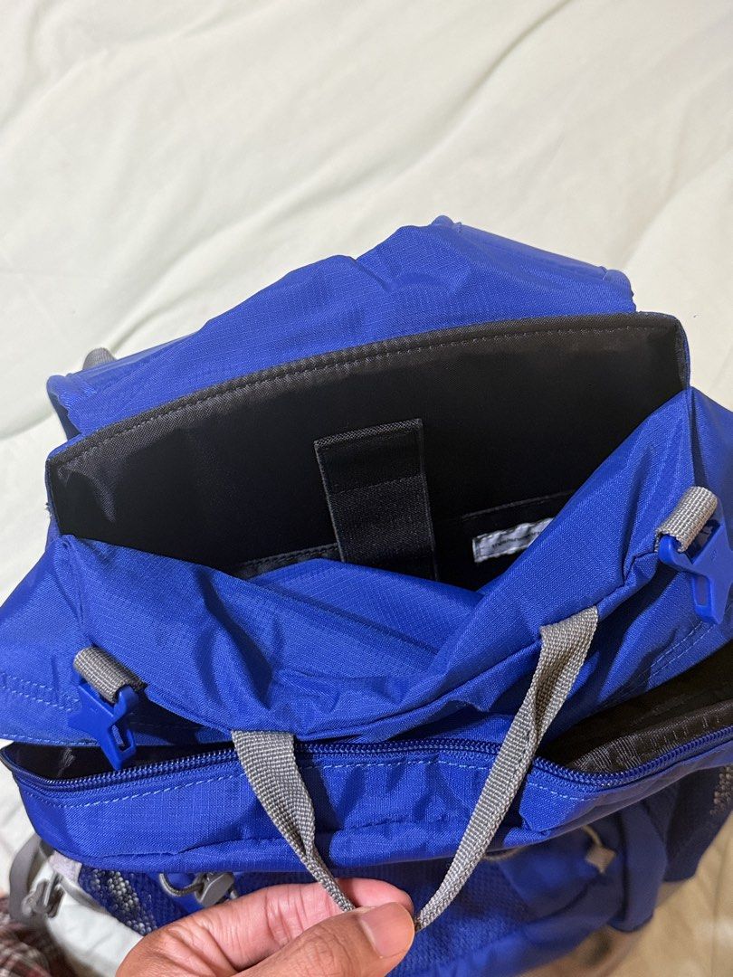 thisisneverthat Backpack (Category: Backpacks) located in Singapore. Submitted by samagksan (Listing ID 1461618060, Image 6). Description: - Brand: thisisneverthat - Color: Blue - Features: Multiple pockets for organization - Side Pockets: Mesh - Front Compartment: Zip closure - Reflective Details: On cords and straps - Ideal for: School, day trips.