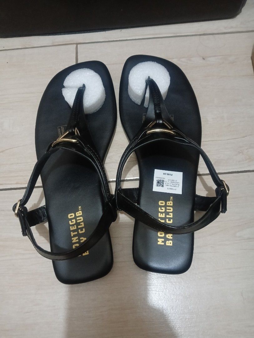 Thong flat sandals (Category: Flats & Sandals) located in Makati City. Submitted by maloustuffs_2025 (Listing ID 1462691079, Image 1). Description: Thong black sandals. Best fits to US 38 since it's an American sizing. Very comfy to wear. RFS: Wrong size too big for me..