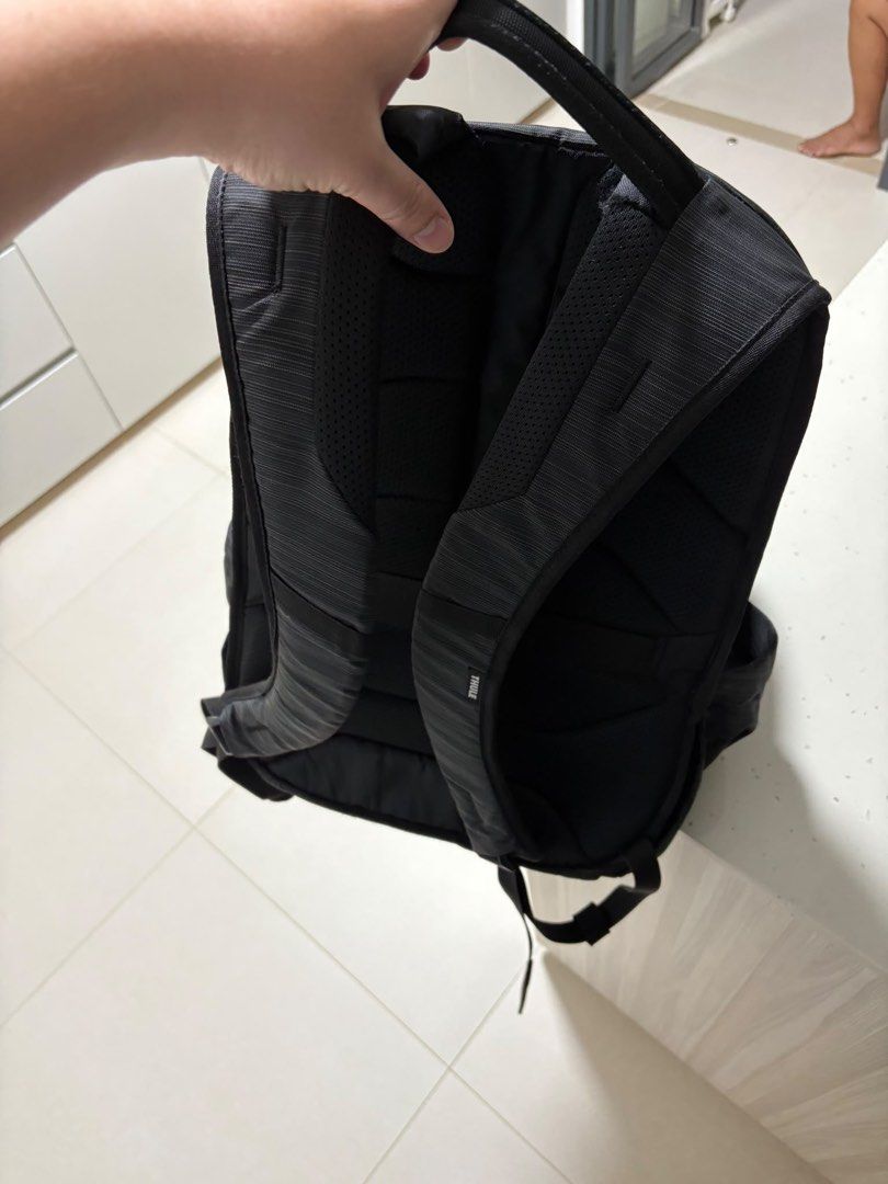 Thule Construct Backpack 24L (Category: Backpacks) located in Singapore. Submitted by leexlss (Listing ID 1462772968, Image 5). Description: • Condition: Well used • 24L capacity • Fits laptop up to 15.6” • Multiple compartments for laptop, tablet & daily essentials • Side pockets for water bottle • Luggage pass-through strap – convenient for travel • Comfortable padded back panel • Durable and practical for everyday use Well used with normal sig