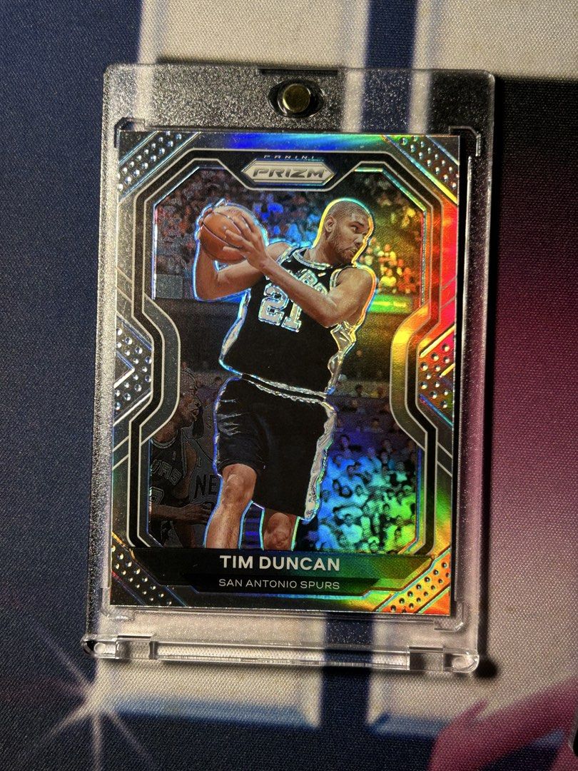 Tim Duncan Silver Prizm San Antonio Spurs (Category: Raw Singles) located in Iloilo. Submitted by jackpot.treasures (Listing ID 1462752480, Image 1). Description: - 2020-21 Panini Prizm Tim Duncan Card - Features San Antonio Spurs Legend Tim Duncan - Card is protected in a sleeve and top loader - Ideal for any Spurs or Timmy D fan's collection - Don't miss this collectible!.