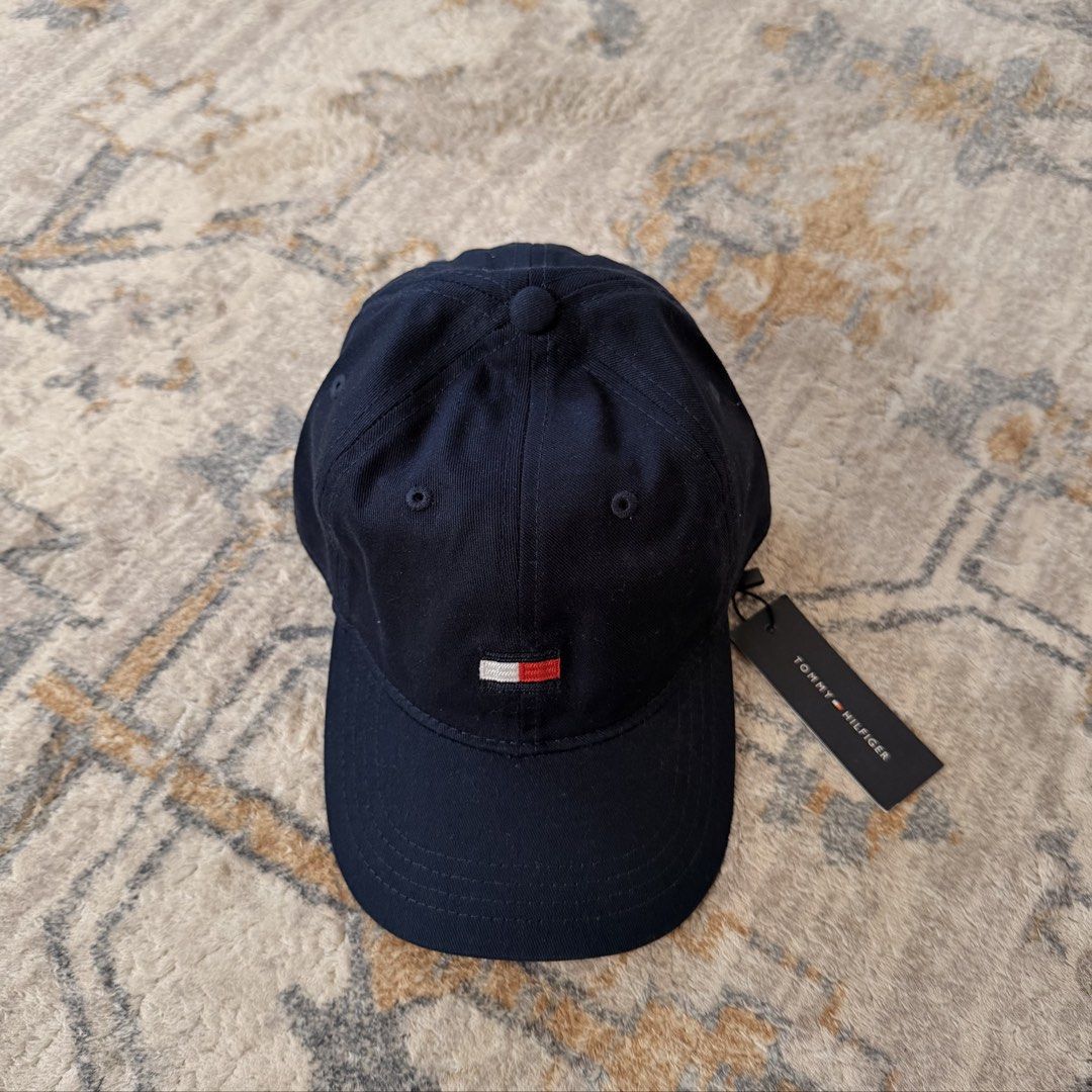 tommy hilfiger navy baseball cap (Category: Caps & Hats) located in Angeles City. Submitted by alexandramhaey (Listing ID 1462777142, Image 1). Description: guaranteed authentic :) unisex & one size only.