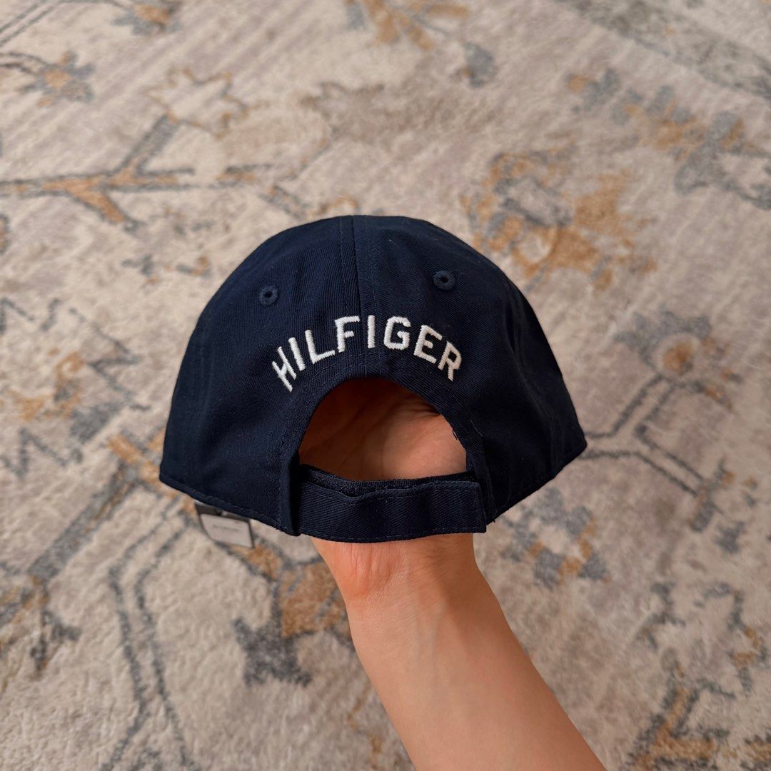 tommy hilfiger navy baseball cap (Category: Caps & Hats) located in Angeles City. Submitted by alexandramhaey (Listing ID 1462777142, Image 2). Description: guaranteed authentic :) unisex & one size only.
