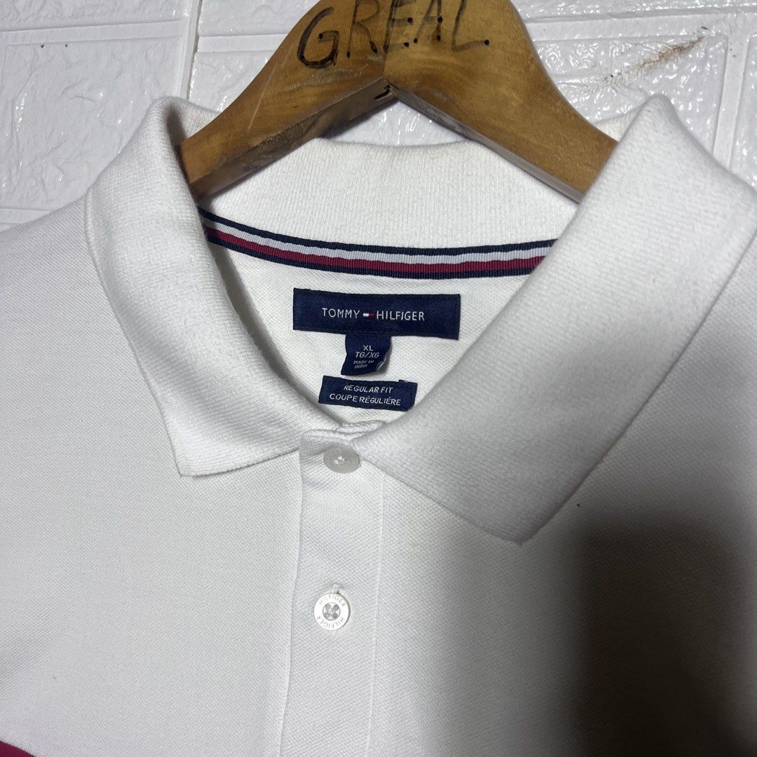 Tommy Hilfiger Polo Shirt (Category: Tshirts & Polo Shirts ) located in Palompon. Submitted by paulrojas13 (Listing ID 1462837414, Image 2). Description: Size: XL on tag Dimensions: 23 x 27 Condition: As New Color Rate: 9.9/10 Issue: minimal scratch .