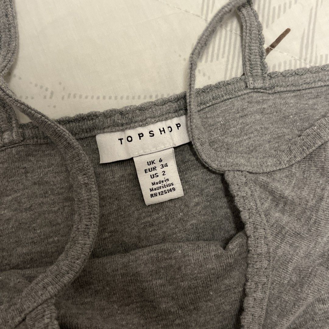 Topshop Grey Tank Top Crop (Category: Sleeveless) located in Las Pinas. Submitted by thevallerys (Listing ID 1462823242, Image 2). Description: - Brand: Topshop - Color: Grey - Style: Spaghetti strap tank top - Design: Simple and classic - Features: Comfortable and versatile, great for layering or wearing on its own - Size: UK 6 / EUR 34 / US 2.