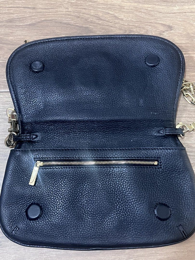 Tory Burch Amanda (Category: Luxury Bags & Wallets) located in Danao, Cebu. Submitted by myusedthingy (Listing ID 1462746626, Image 2). Description: Tory Burch Amanda Black Pebbled Leather Chain Clutch/Shoulder Bag/cross body bag/Removable strap Pre-loved Guaranteed Authentic from Japan Overall Exterior: Excellent pre-owned condition. The pebbled leather is clean, well-structured, and has no major flaws, rips, or tears. Strap & Hardware: Shows no