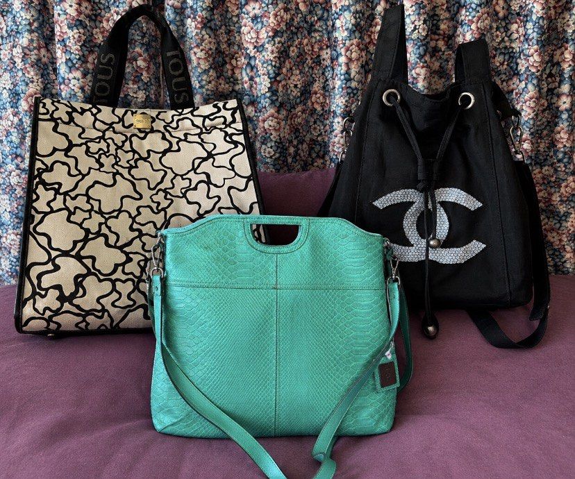 TOUS , Chanel , Tommy Hilfiger (Category: Tote Bags) located in Las Pinas. Submitted by betchai17 (Listing ID 1462885229, Image 1). Description: ALL FOR 600 ONLY Classic TOUS tote bag - Signature bear print - Chic black and white design - Spacious interior for all your essentials - Comfortable shoulder straps - Ideal for everyday use - A stylish and practical accessor Chanel - Drawstring bucket bag Tommy Hilfiger - Two way snake skin bag .