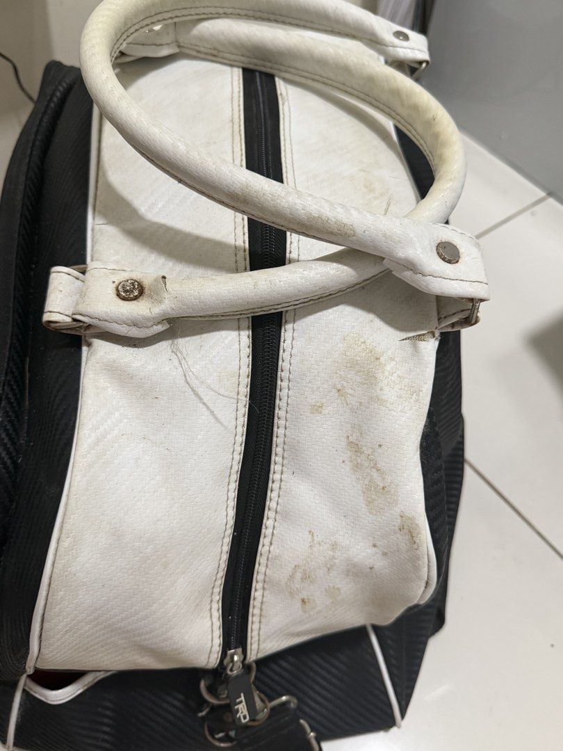 TRD Racing Development Duffel Bag (Category: Luggage) located in Binan City. Submitted by meloo12 (Listing ID 1462766122, Image 3). Description: - TRD duffel bag -Carbon external fabric - White and black design with red trim - Main zipper compartment - Handles - Detachable shoulder strap included - Minor dirt marks on white handles and body - Zippers and strap hardware are intact Listed in the market for $250 but still negotiable. Rfs: declutteri