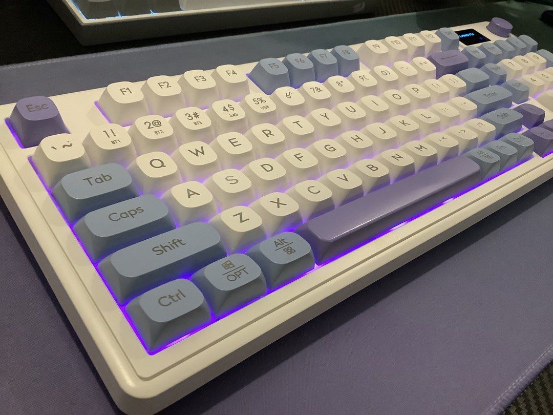Tri-Mode Silent Keyboard (Category: Computer Keyboard) located in Calamba. Submitted by keeprees (Listing ID 1462877888, Image 1). Description: Langtu L-Series Tri-Mode Silent Keyboard - Full-sized with numpad - Unique purple and blue color scheme - Ideal for both typing and gaming - Rated input current: <250mA - Executive Standard: GB/T14081-2010 -Can Connect up to 3 devices for easy switching (Bluetooth) -Supports mac and windows layout .