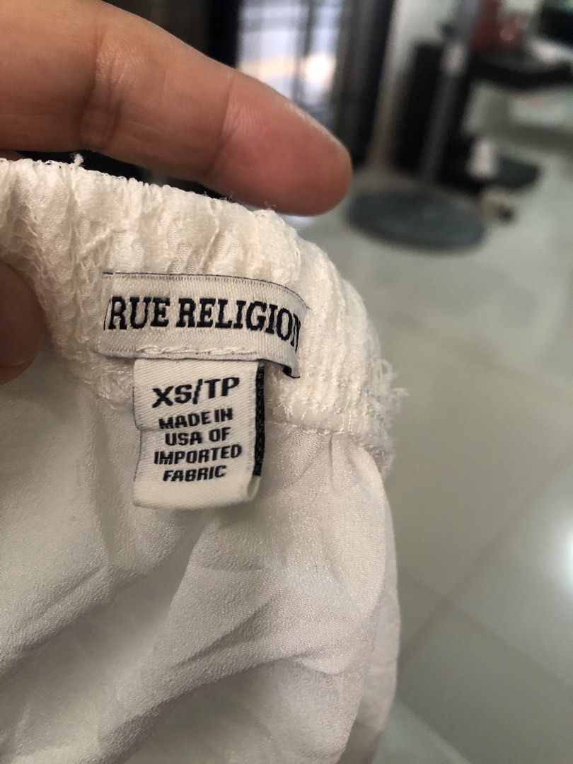 TRue Religion White Lace Off-Shoulder Top (Category: Sleeveless) located in San Fernando. Submitted by dizoncynt68396 (Listing ID 1462744478, Image 3). Description: - White off-shoulder top from TRue Religion - Lace detailing on sleeves and hem - Made in USA of imported fabric - Size XS/TP on tag but can fit up to semi large - Ideal for a night out or special occasion Message if you are interested! For sure buyers only.This is collectible piece. 