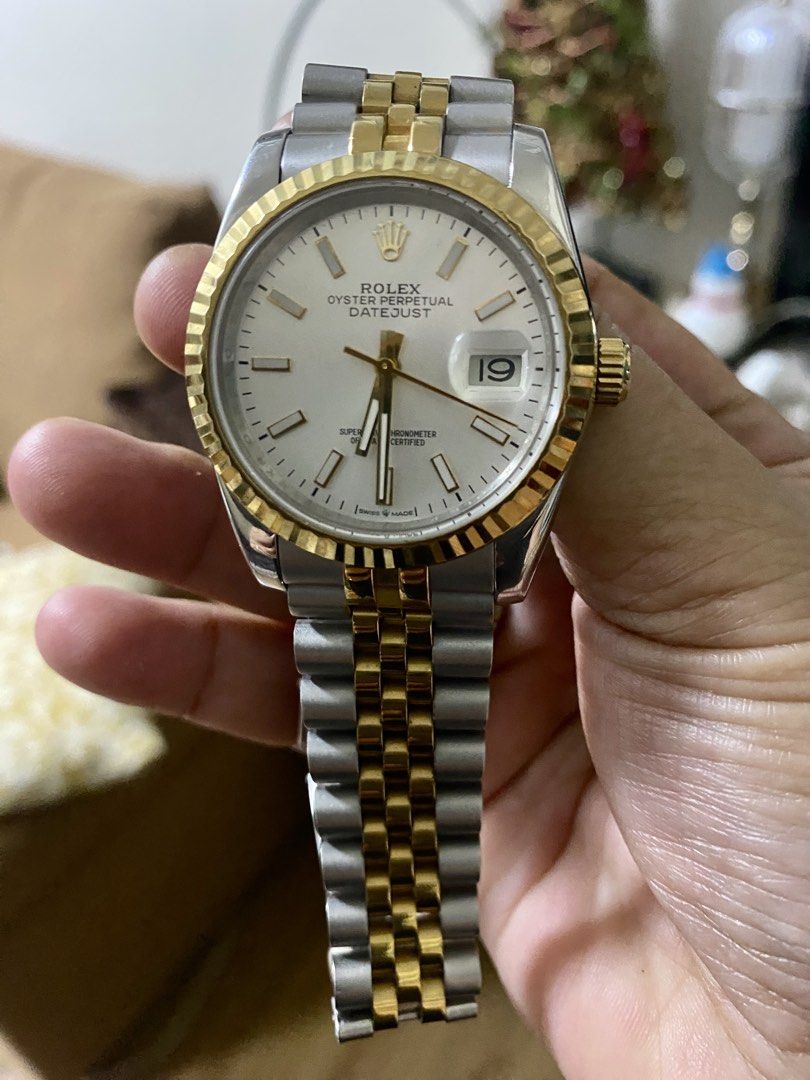 Two-Tone Watch (Category: Women's Watches) located in Makati City. Submitted by dpjanssen (Listing ID 1462820549, Image 1). Description: - Two-tone stainless steel - Classic white dial with date window - Comfortable Jubilee bracelet - Versatile timepiece suitable for all occasions - Feel free to ask questions! -nice in actual -rfs: urgent need if funds -last price posted.