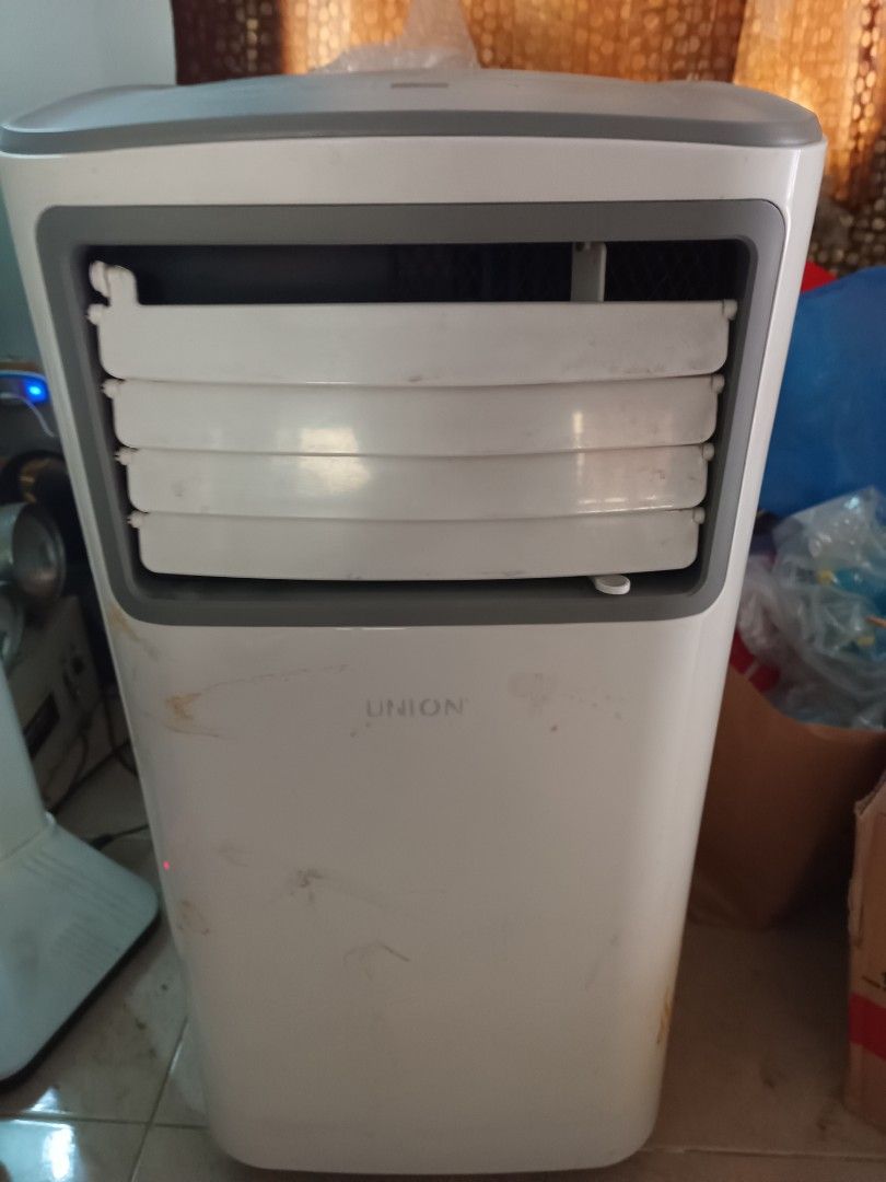 UNION Portable Air Conditioner With Issue (Category: Air Conditioning and Heating) located in Bacoor. Submitted by purelion_d89f47 (Listing ID 1462827224, Image 1). Description: - UNION Portable Air Conditioner - Modes: Cool, Fan, Dry - Digital Display -Compressor; working condition but not satisfyingly cool. - Minor scuffs and marks on body - Ideal for room cooling. -Inclusions Unit and Original Box Only; NOTE TO VIEWERS: If you would like to in