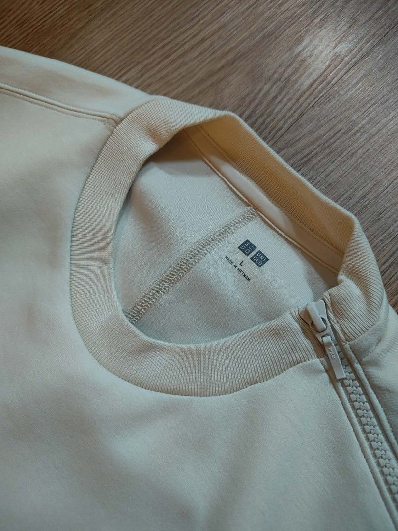 Uniqlo Beige Oversized Sweatshirt Size L (Category: Coats, Jackets and Outerwear) located in Muntinlupa City. Submitted by thegoodthriftph (Listing ID 1462792991, Image 3). Description: - Uniqlo Oversized Sweatshirt - Color: Light Beige - Style: Crewneck, Relaxed Fit - Features: Ribbed cuffs and hem - Origin: Made in Vietnam - Versatile: Great for casual wear and layering, easy to style..