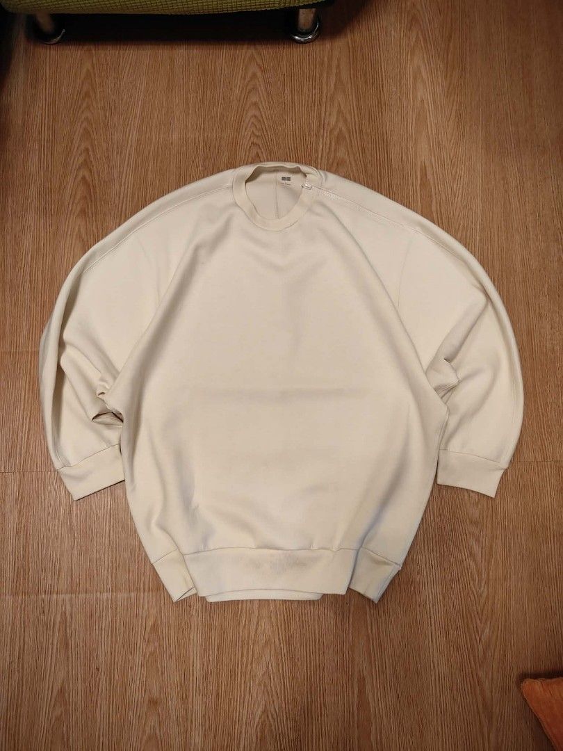Uniqlo Beige Oversized Sweatshirt Size L (Category: Coats, Jackets and Outerwear) located in Muntinlupa City. Submitted by thegoodthriftph (Listing ID 1462792991, Image 2). Description: - Uniqlo Oversized Sweatshirt - Color: Light Beige - Style: Crewneck, Relaxed Fit - Features: Ribbed cuffs and hem - Origin: Made in Vietnam - Versatile: Great for casual wear and layering, easy to style..