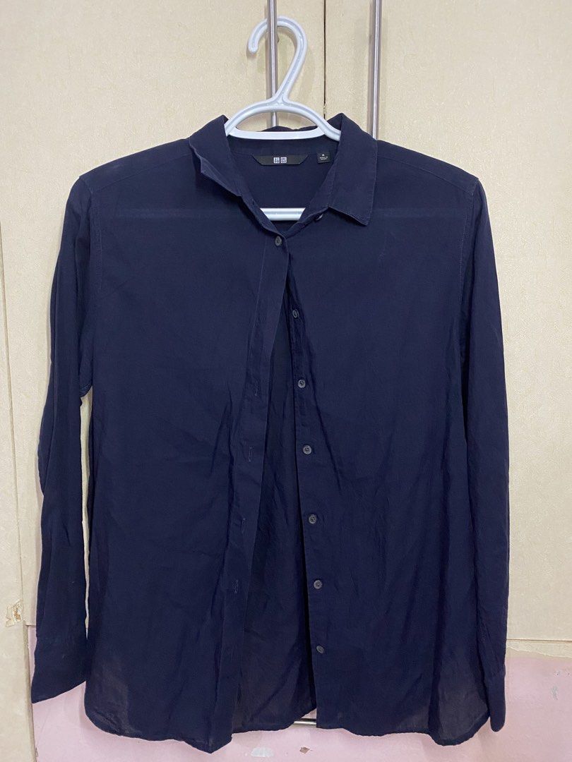 Uniqlo Long Sleeve Button Down Shirt Size M (Category: Tshirts & Polo Shirts ) located in Cagayan de Oro. Submitted by chewy.declutters (Listing ID 1462866981, Image 1). Description: - Uniqlo Long Sleeve Shirt - Color: Navy Blue - Style: Button-down with collar - Size: Medium (M) - Origin: Made in China - Versatile: Suitable for casual outings or work attire.